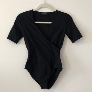 Topshop black short sleeve body suit. Size 4